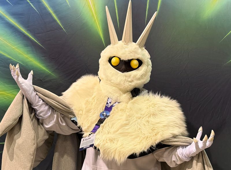 Completed Radiance cosplay from Hollow Knight at a convention